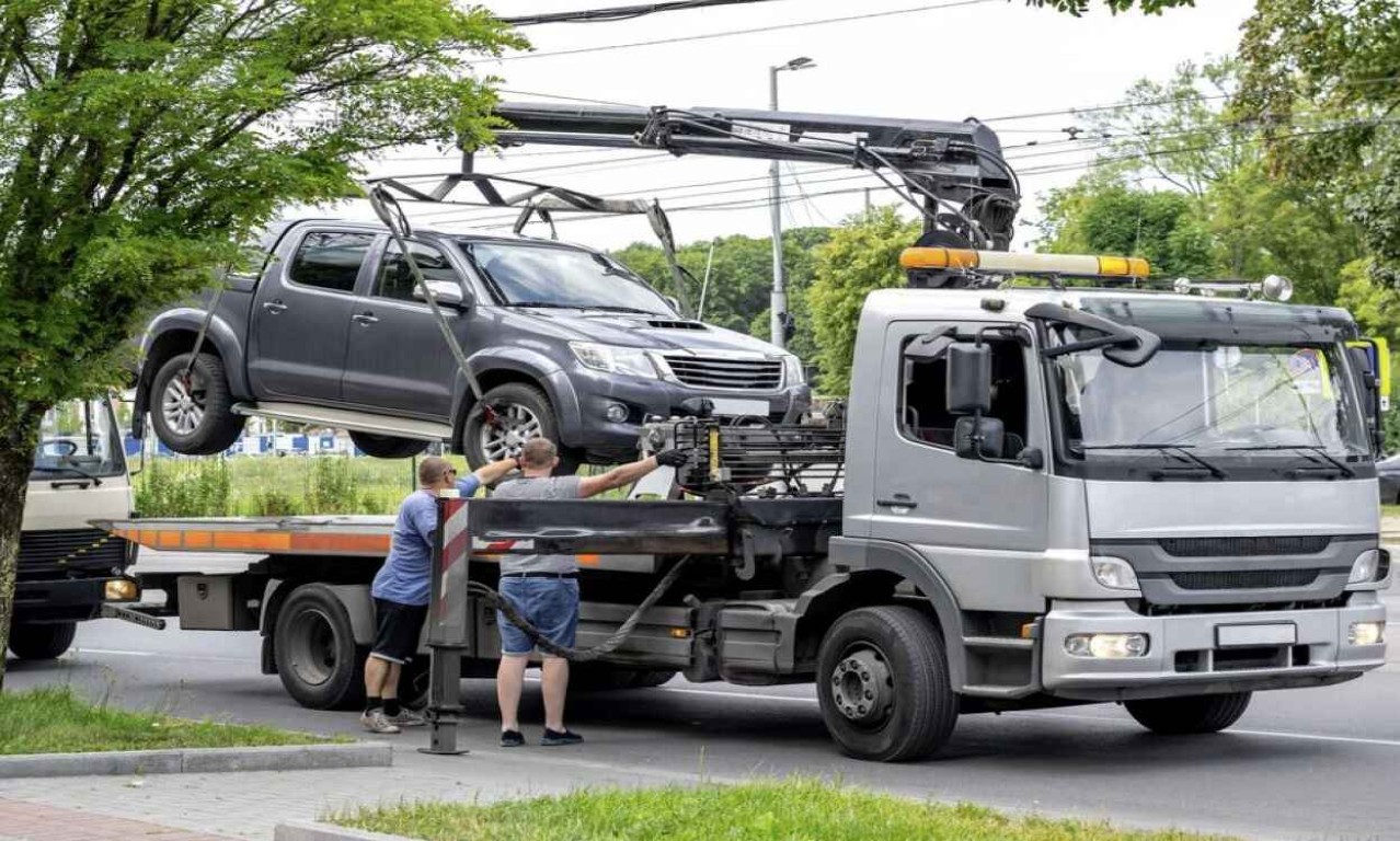 Professional tow truck operators providing roadside assistance in Carmel, IN